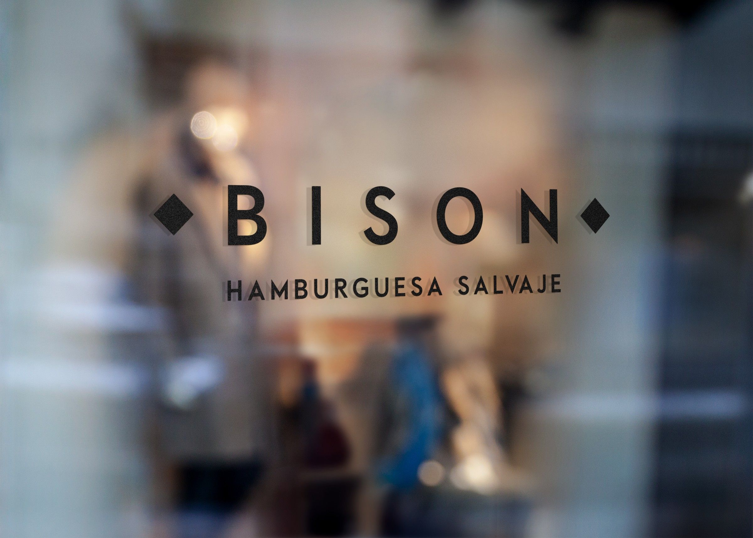 BISON Hamburguesa Salvaje lettering on a shop window