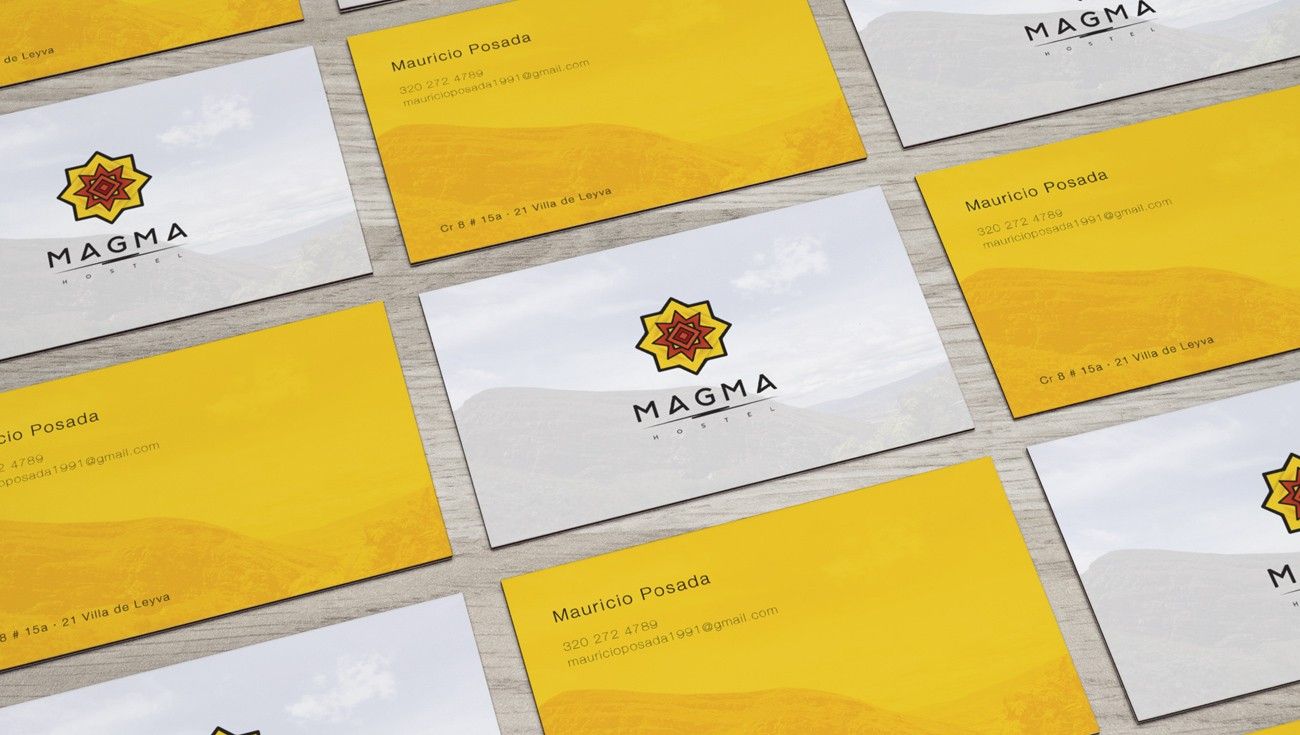 Rows of yellow and white Magma Hostel business cards
