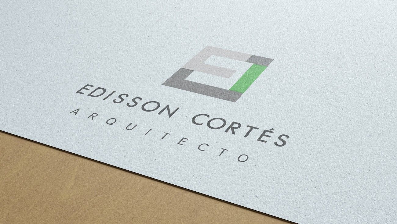 Edisson Cortés logo printed on paper, at an angle