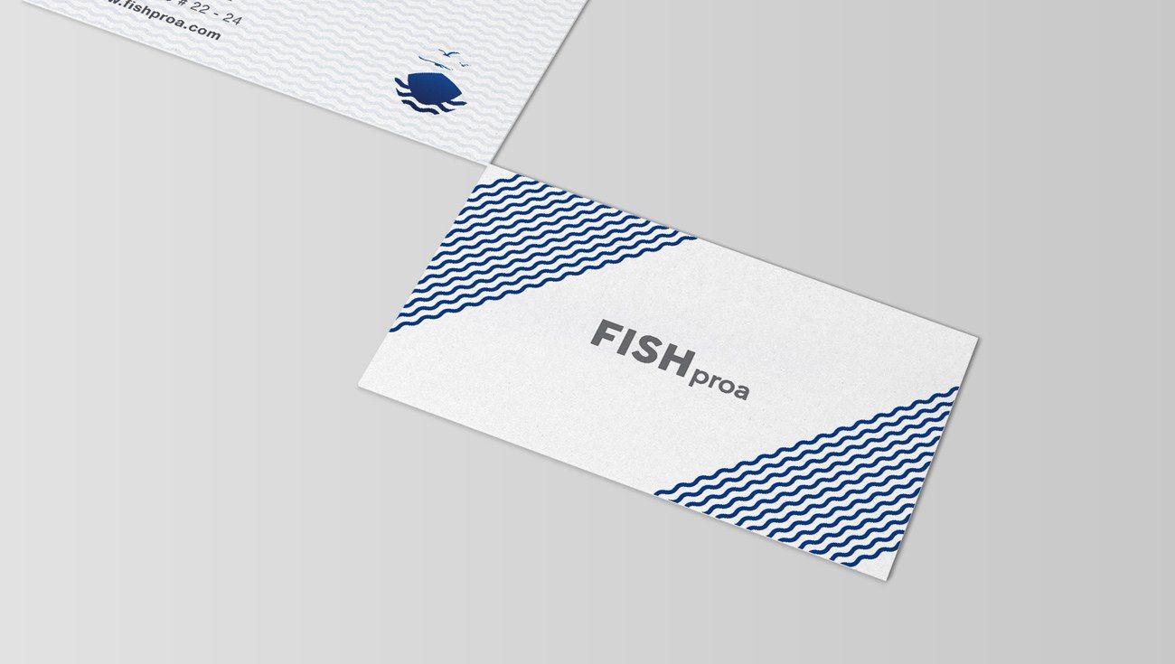 FISHproa business cards with blue wave patterns and the logo