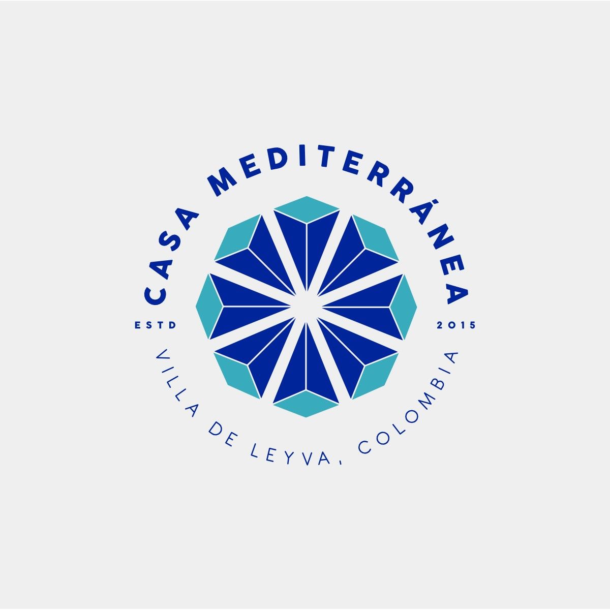 Casa Mediterránea logo, a blue and turquoise geometric star in a circular badge reading Villa de Leyva, Colombia, established 2015