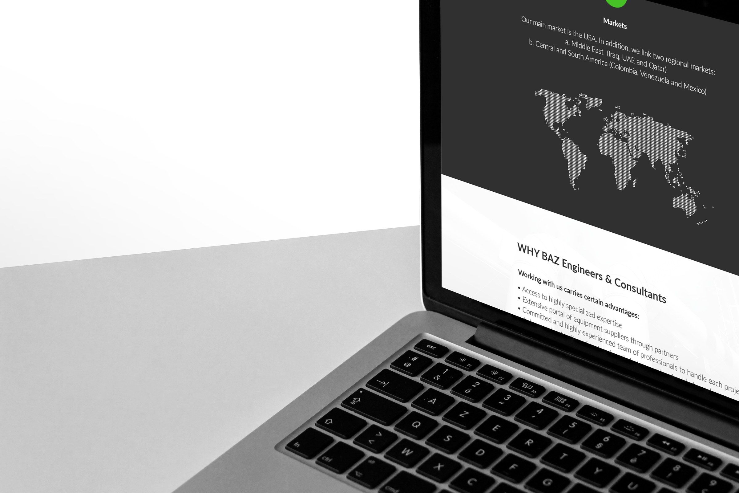 Laptop showing the BAZ markets page with a world map